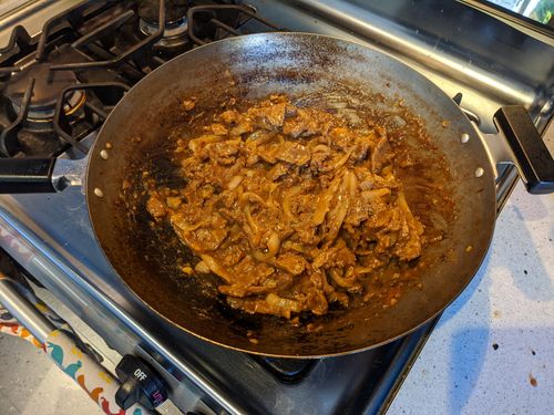 Beef and onions after sauce