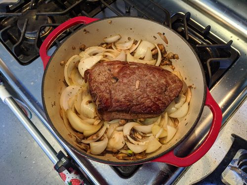 Sirloin with mushrooms and onions