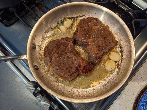 Steaks basted